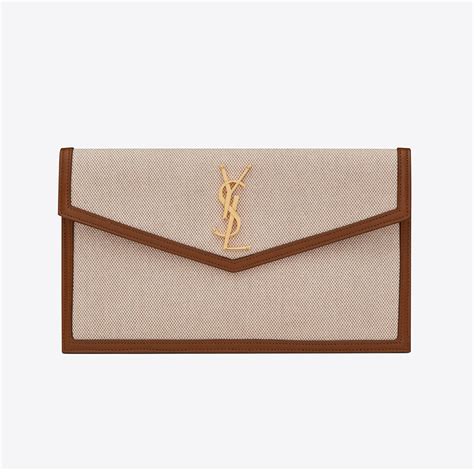 ysl uptown portemonnaie|UPTOWN pouch in canvas and smooth leather .